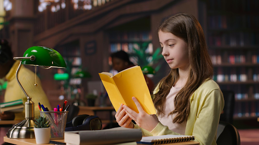 A student reading in a library